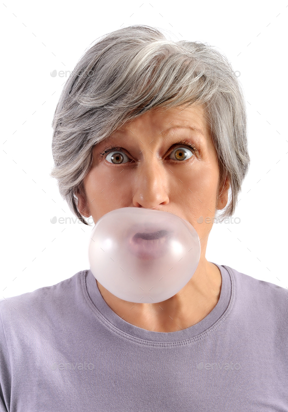Adult Woman Blowing Chewing Gum Stock Photo by Photology75 PhotoDune